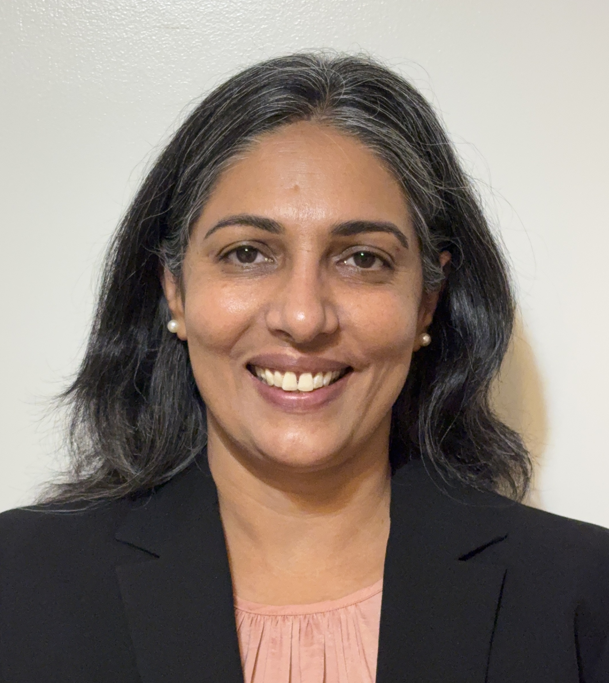 Dr. Neetu Dahiya — Real Estate Agent